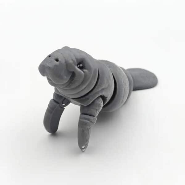 Charming 3D Printed Manatee Statue with Expressive Eyes - Image 2