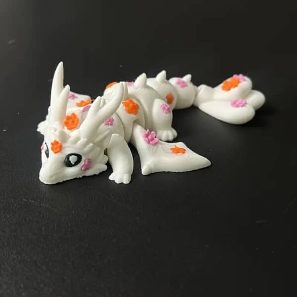 Articulated Peach Dragon Statue with Movable Joints - Image 4