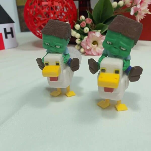 Articulated 3D Printed Green Monster Riding with White Chick - Image 4