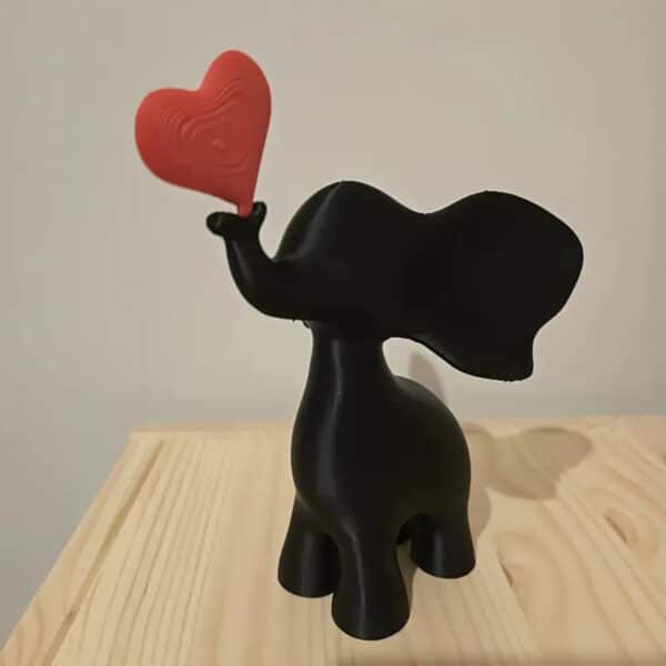 3D Printed Modern Playful Elephant with Holding Red Heart - Image 3